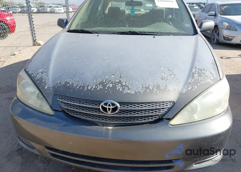 2003 Toyota Camry Le z USA, uszkodzony, nr VIN 4T1BE30K13U725595